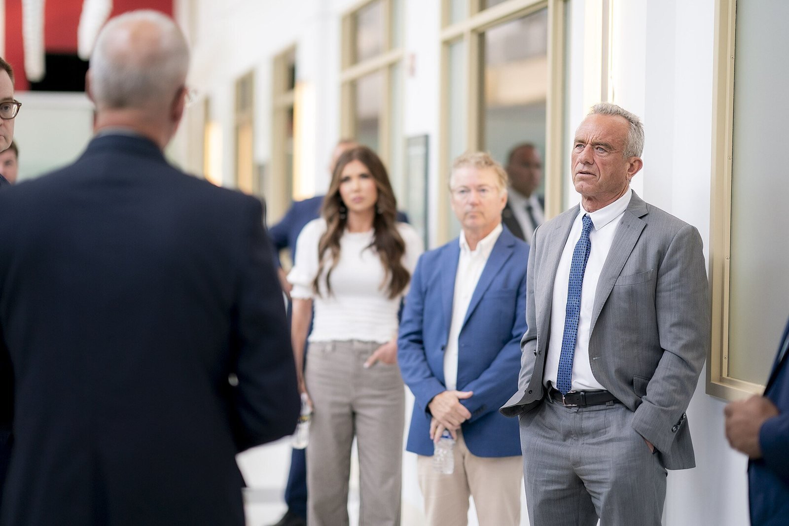 Senator Rand Paul listening during a tour of a US biodefense laboratory at Fort Detrick, Maryland, in June 2025